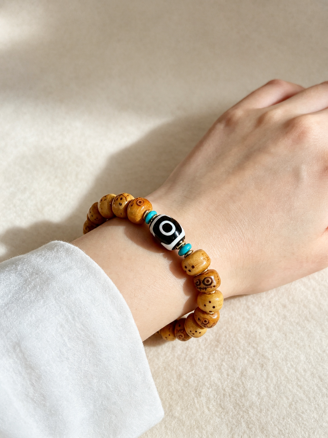 Tibetan Yak Bone Bead Bracelet with Dzi-Style Accent