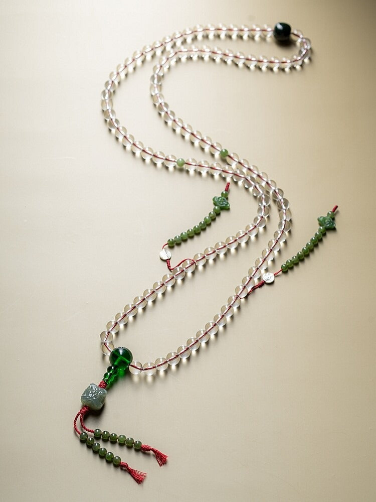 Clear Tibetan-style natural white crystal 108 mala with green accents