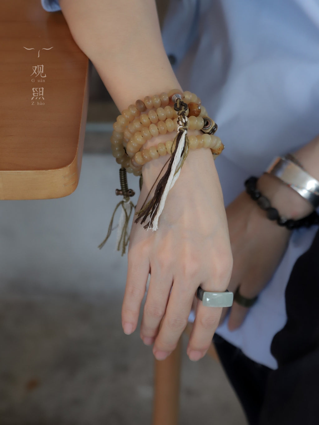 Sheep horn 108 mala wrapped around the wrist with tassel accents