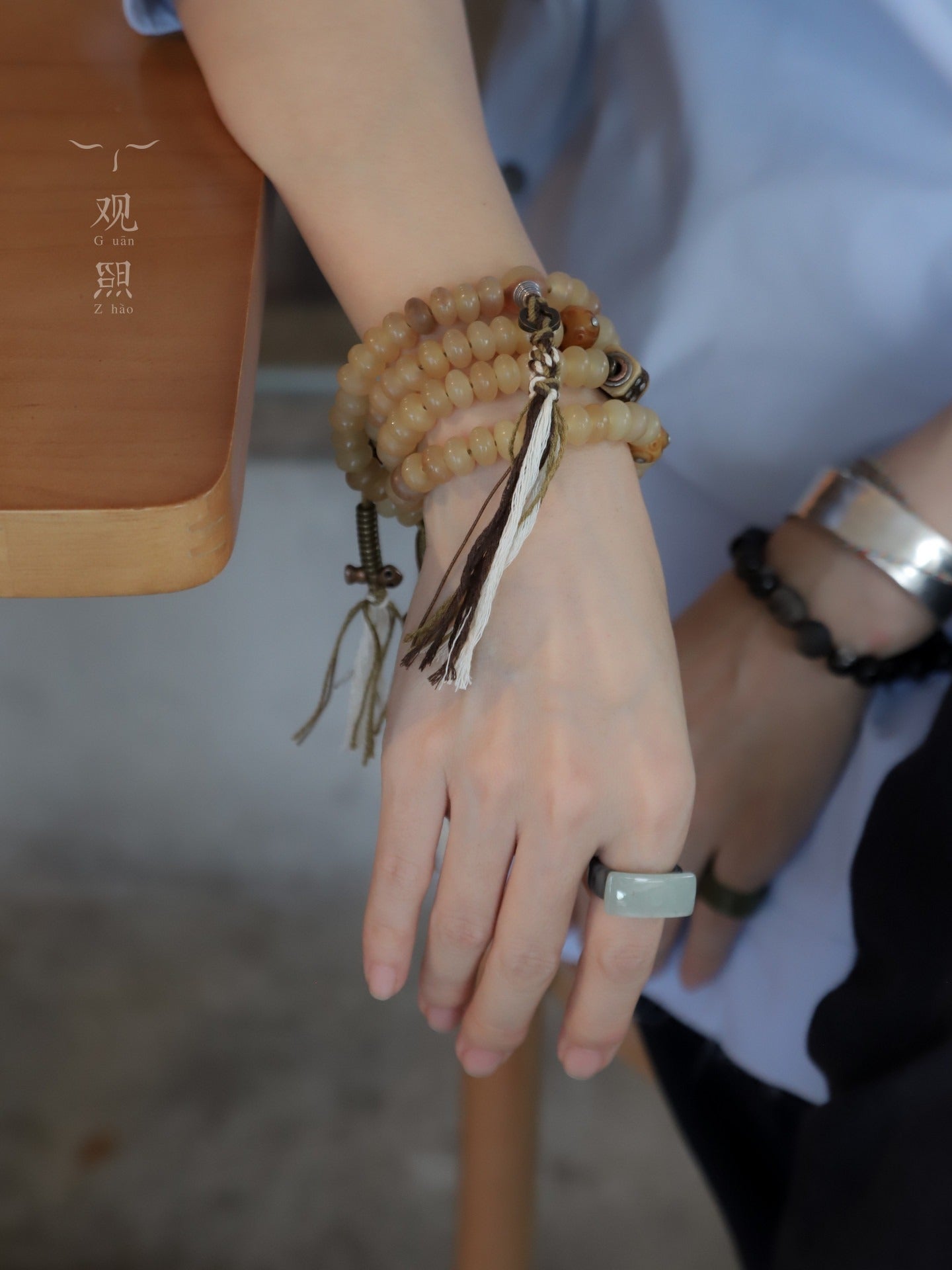 Sheep horn 108 mala wrapped around the wrist with tassel accents