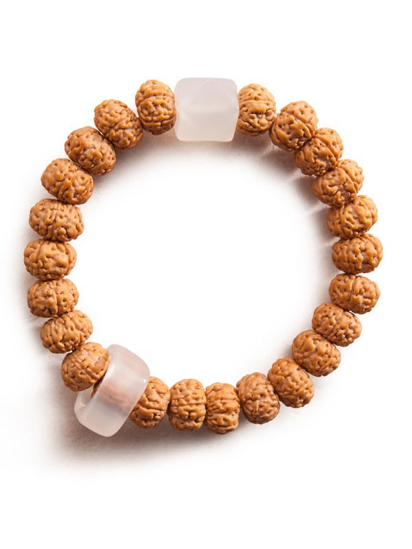 Jia Vajra bodhi and white agate bracelet on light background