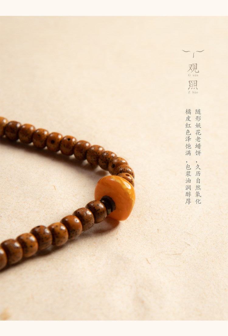 Detail of Kangba Guanzhao Xingyue bodhi mala with warm brown beads