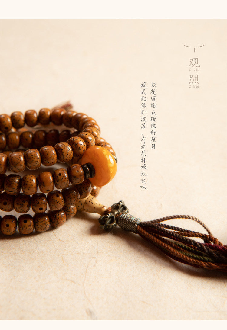 Xingyue bodhi 108 mala with tassel and metal accent detail