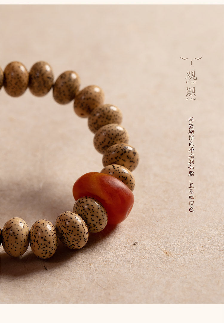 Xingyue bodhi bracelet with red resin-style accent bead