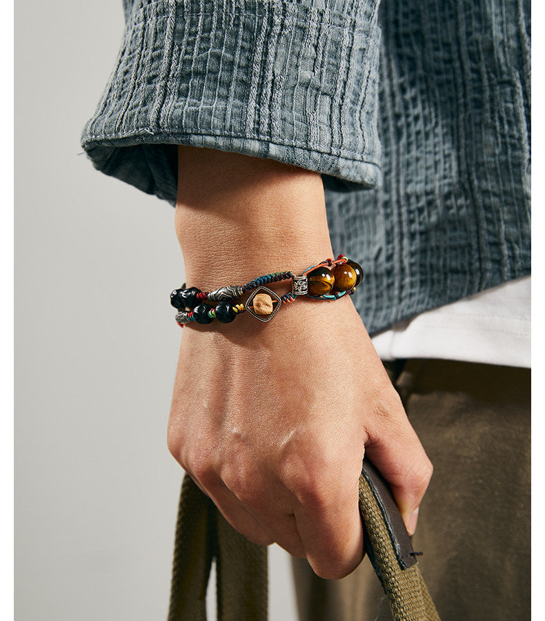 Unisex woven bead bracelet worn with casual clothing