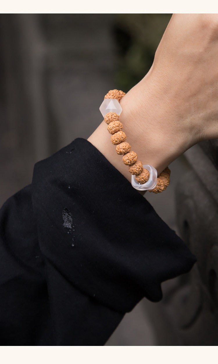 Minimal Vajra bodhi and white agate bracelet styled on wrist