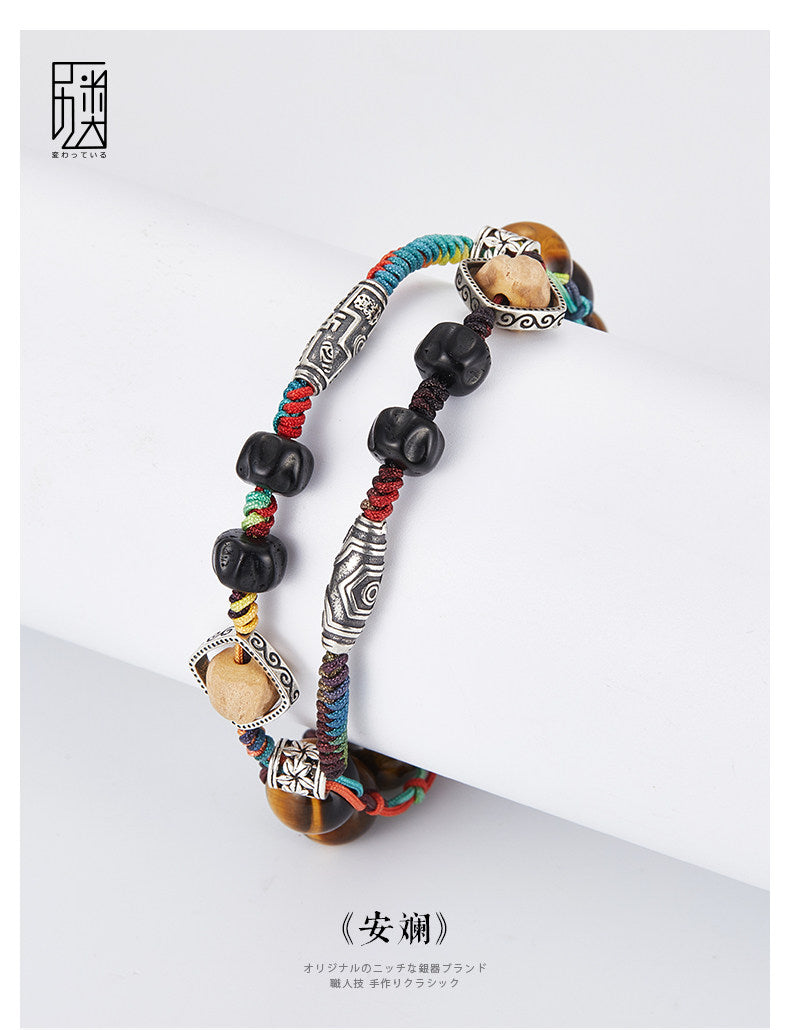 Anlan woven bracelet product image with brown and black beads