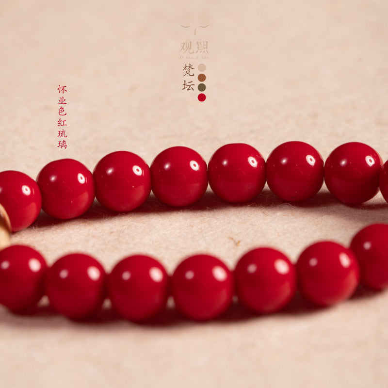 Close detail of vivid red glass beads in Huaiye red tone